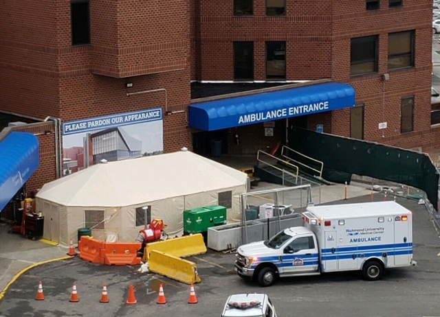 A medical tent is stationed outside Richmond University Medical Center in West Brighton[2]
